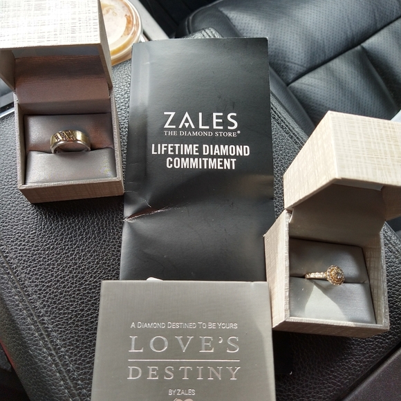 An engagement ring and man's wedding band . - Picture 6 of 10